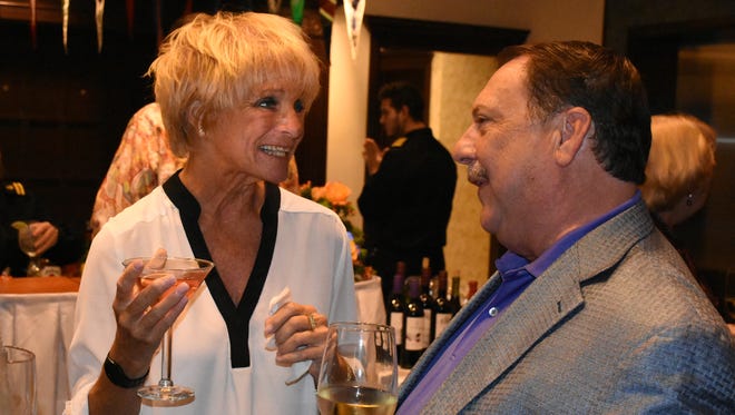 Debra Shanahan talks with Jim Richards. The Marco Island Area Chamber of Commerce held its installation of the 2018 slate of officers and directors, and graduation ceremony for the Leadership Marco class of 2017, Saturday evening at the Marco Island Yacht Club.