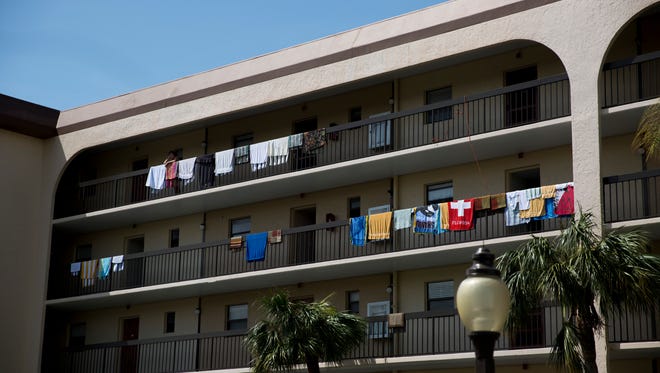 Residents hang their towels and other laundry to dry at Angler's Cover Condominiums Marco Island, Fla. Monday, September 11, 2017.