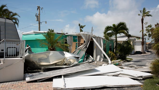 Damage in Drop Anchor, a 55-and-over community, can be seen after Hurricane Irma passed through the state the previous day Monday, September 11, 2017.