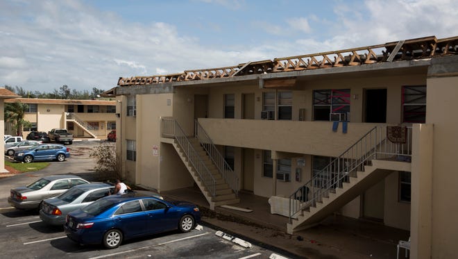 Several buildings in the Gordon River Apartment Complex had their roofs blown away by Hurricane Irma. Damage can be seen Monday, September 11, 2017.