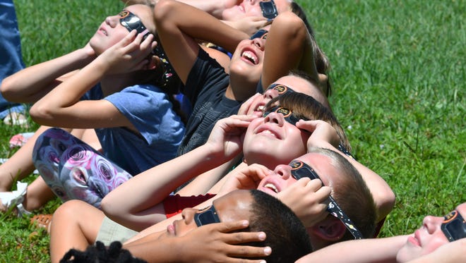 At Ocean Breeze Elementary School in Indian Harbour Beach,first through sixth grades went outside to view the solar eclipse with the correct glasses. Pre-k and kindergarten viewed the event on televisions in the classroom.