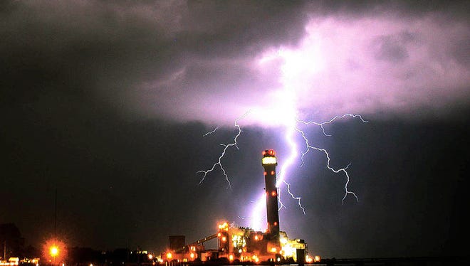 Lightning blasts out of a thunderstorm  near a power-generating station in Upper Township, N.J.., on Aug. 15,  2011.   Climate change could lead to more lightning strikes in the USA, a new study predicts.