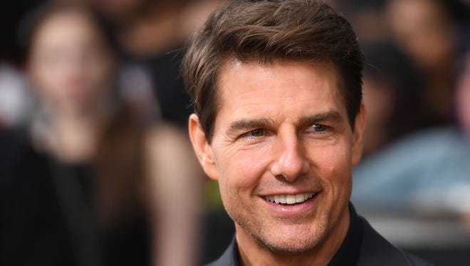 (FILES) This file photo taken on June 06, 2017 shows actor Tom Cruise attendsing 'The Mummy' New York Fan Event at AMC Loews Lincoln Square in New York City.
Filming of "Mission: Impossible 6" has been delayed by up to three months after its star Tom Cruise damaged his ankle in a botched stunt, US media reported on August 16, 2017. The 55-year-old, known for performing his own death-defying stunts, was injured as he attempted a jump between buildings while attached to cables but fell short and slammed into a concrete wall.
 / AFP PHOTO / ANGELA WEISSANGELA WEISS/AFP/Getty Images ORG XMIT: 1 ORIG FILE ID: AFP_RM4OD