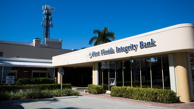 895 Fifth Ave. S. houses First Florida Integrity Bank on Thursday, Dec. 29, 2016, in downtown Naples.