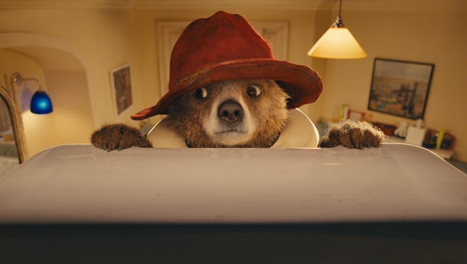 Paddington, voiced by Ben Whishaw, gets his sweet due in the film.