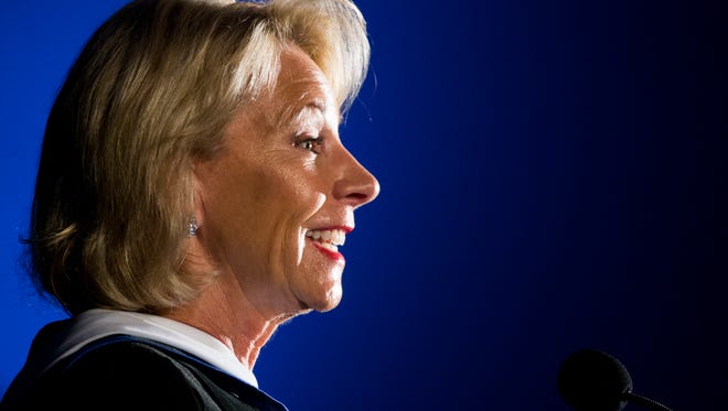 U.S. Secretary of Education Betsy DeVos delivers the commencement address during Ave Maria's 2018 graduation ceremony at Golisano Field House Saturday, May 5, 2018 in Ave Maria.