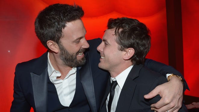 Affleck and his younger brother Casey Affleck attend the InStyle and Warner Bros. 70th Golden Globe Awards after party on Jan. 13, 2013.
