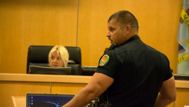 File: MIPD Officer Kevin Hennings testifies before Special Magistrate Myrnabelle Roche.