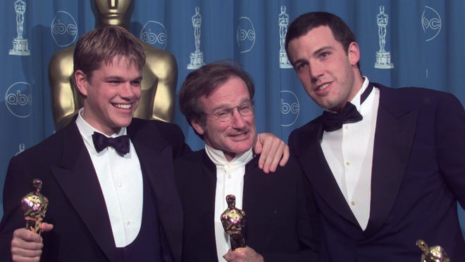 " Good Will Hunting " co-stars Matt Damon, Robin Williams and Affleck pose with their Oscars at the 70th Academy Awards on Mar. 23, 1998.