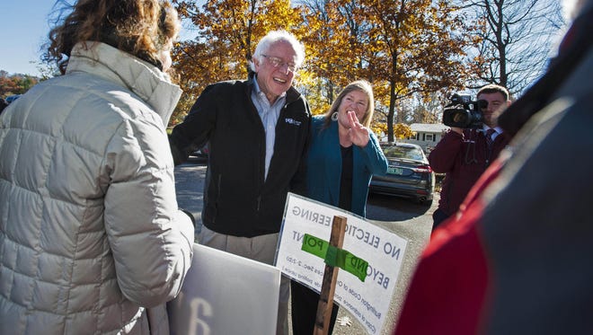 Nov 8, 2016; Burlington, VT, USA;  Former presidential candidate senator Bernie Sanders , I-VT, arrives with his wife Jane O'Meara Sanders to cast their ballots in the presidential election at the Robert Miller Community and Recreation Center. Mandatory Credit: Glenn Russell/Burlington Free Press via USA TODAY NETWORK