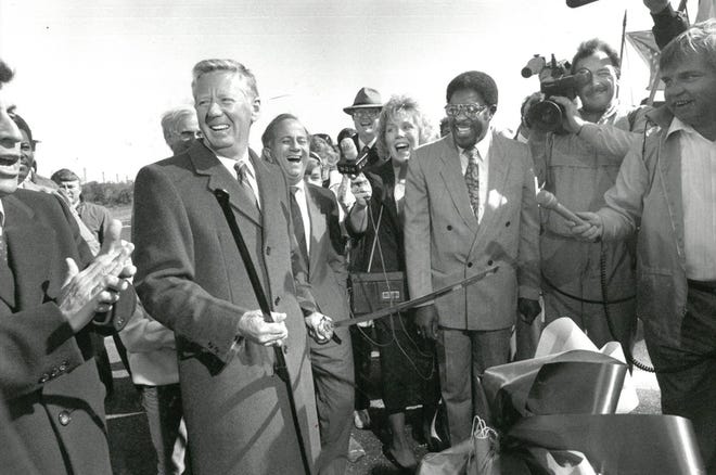 March 10, 1989: With a Japanese sword in hand, Chester Stokes cuts the ribbon in the opening ceremony of the Dames Point Bridge. [Will Dickey, The Florida Times-Union]