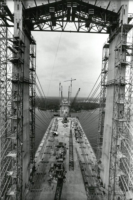 Jan. 14, 1988: In this photo looking north shot from a hanging " man bucket, " the gap between the two spans of the Dames Point Bridge is shown through the spires and stayed cables holding the roadway in place. [Times-Union archives]
