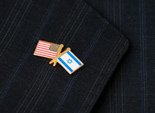 A lapel pin showing solidarity for Israel at an event at Congregation B'Nai Israel in Boca Raton, Florida on October 10, 2023.