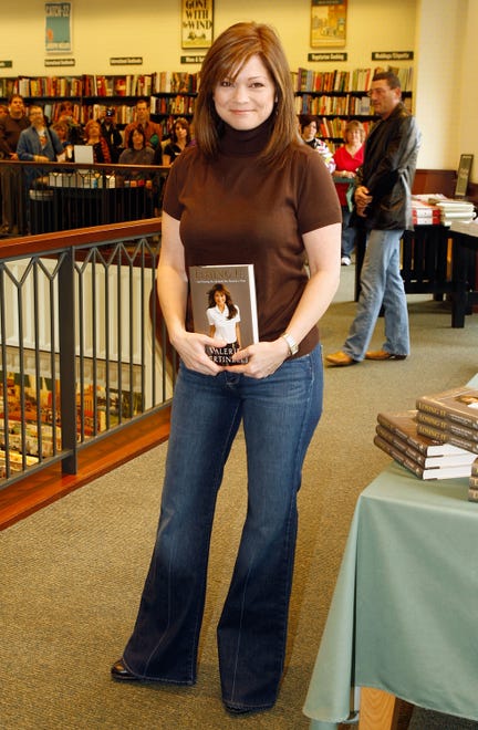 Actress Valerie Bertinelli poses with a copy of her new book "Losing It" at Barnes & Noble at The Grove on March 1, 2008, in Los Angeles, California.