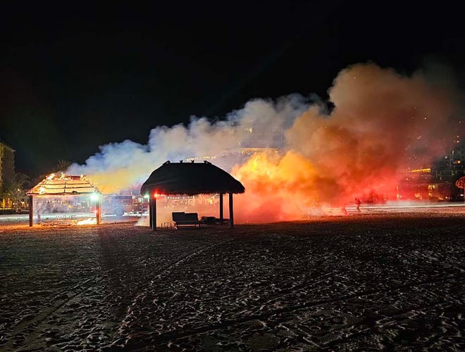 Two tiki huts on the beach behind the JW Marriott Marco Island Beach Resort were destroyed by fire around 10 p.m., Saturday.