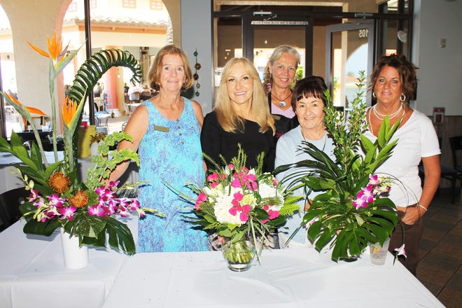 Winners of the Marco Florist floral arrangements are Anne Vannic, Donna Kaczka and Chris Cody.