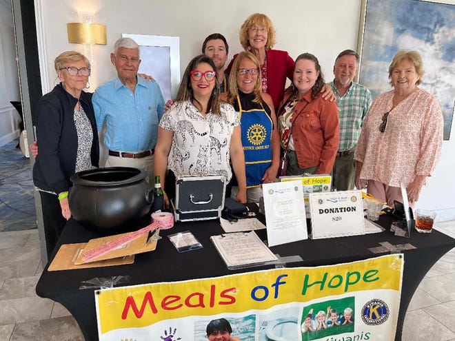 Noontime Rotary and friends at the Happy Hour of Hope.