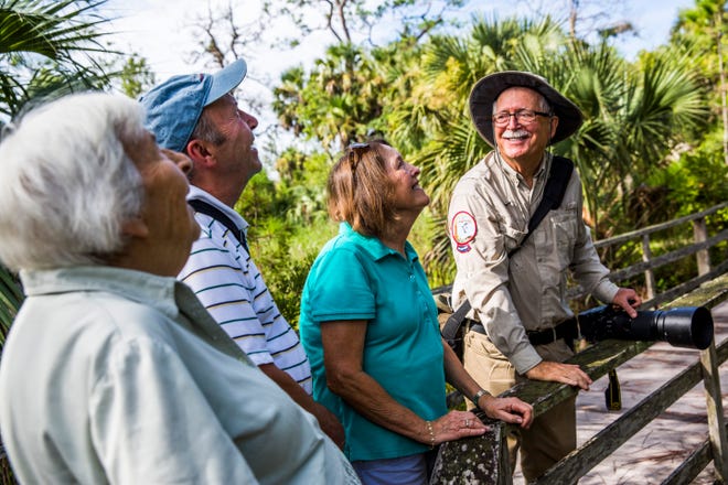 From left, Margarit Leutort, 91, of Naples and her son Werner and his wife Chris take a tour led by volunteer Jerry Jackson at the Audubon Corkscrew Swamp Sanctuary on Wednesday, Aug. 29, 2018.