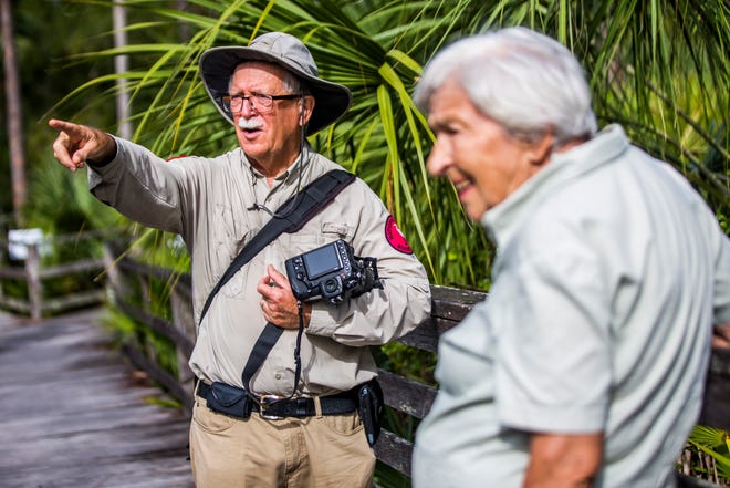 Margarit Leutort, 91, of Naples takes a guided tour led by volunteer Jerry Jackson at the Audubon Corkscrew Swamp Sanctuary on Wednesday, Aug. 29, 2018.