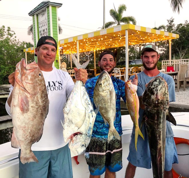 Displaying fresh catch from Dilly's Seafood are, from left, Capt. Tim "Dilly" Dillingham, Corey McBee and Dominick Biagetti at Three60 Market. Dilly's will have a food truck in the new Celebration Park.