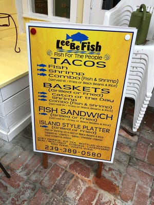 The menu board outside Lee Be Fish Company, Marco Island.