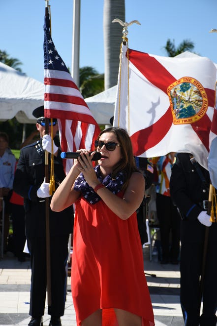 Sarah Hadeka sings the National Anthem. Marco Island honored veterans, in particular female veterans, in Veterans Community Park for Veterans Day, at 11 a.m. Monday, Nov. 12.