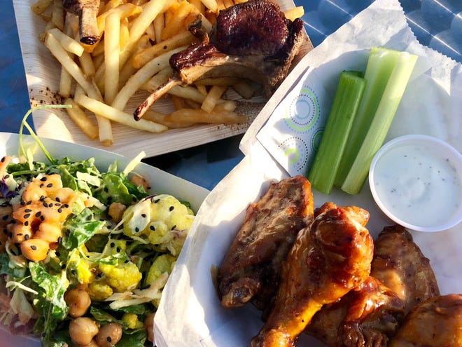 Sweet teriyaki chicken wings from Red's Pizzeria, a tahini cauliflower salad from Smith Organics and grilled lamb chops from Gigi Gourmet.