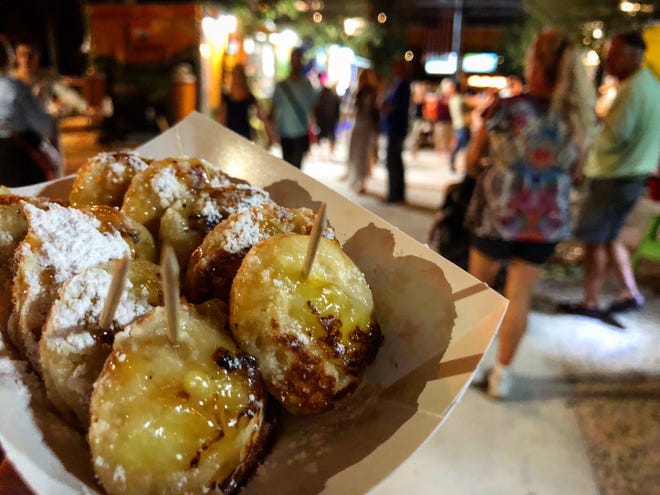Banana poffers with a caramel-rum sauce from Dutchkinz, a food truck at Celebration Park in Naples.