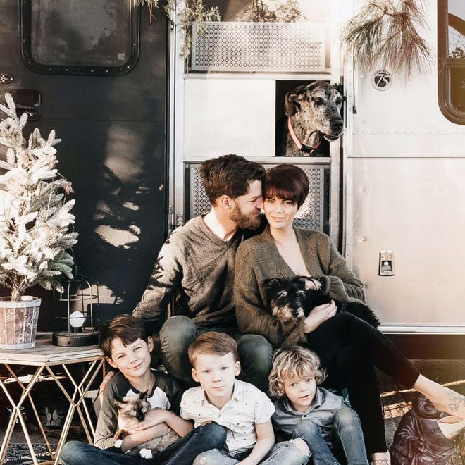 (Left to Right) Eric, Ashley, Matthew, Emerson and Charlie Frantz have been on the road for over a year. The family travels in a renovated Airstream they call Stanley. 
Molly the Great Dane, Bone Crusher and Toby the cat also pictured.