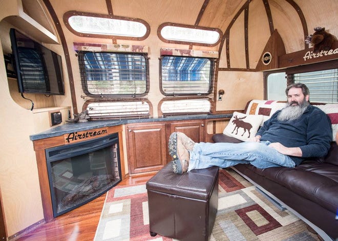 Jim Roy of Monmouth, Maine, in his 1975 Airstream Sovereign.