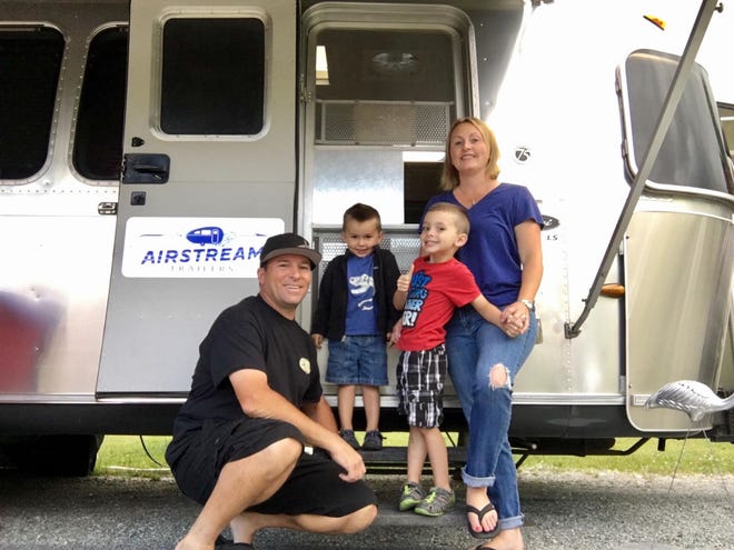 (From left to right) Dean, Jett, Gage and Rebecca Machado posed in front of their 2006 Airstream in Acampo, California.