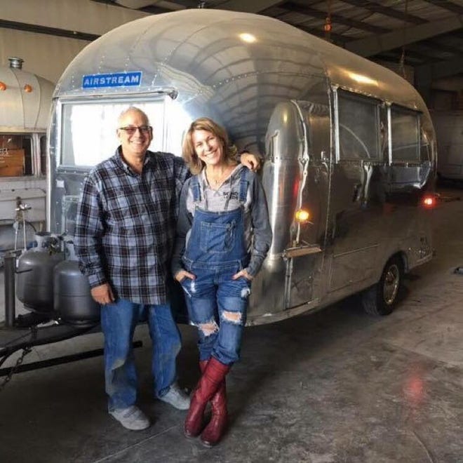 Margi (right) and Robert Sivek (left) own a 1961 Airstream Bambi