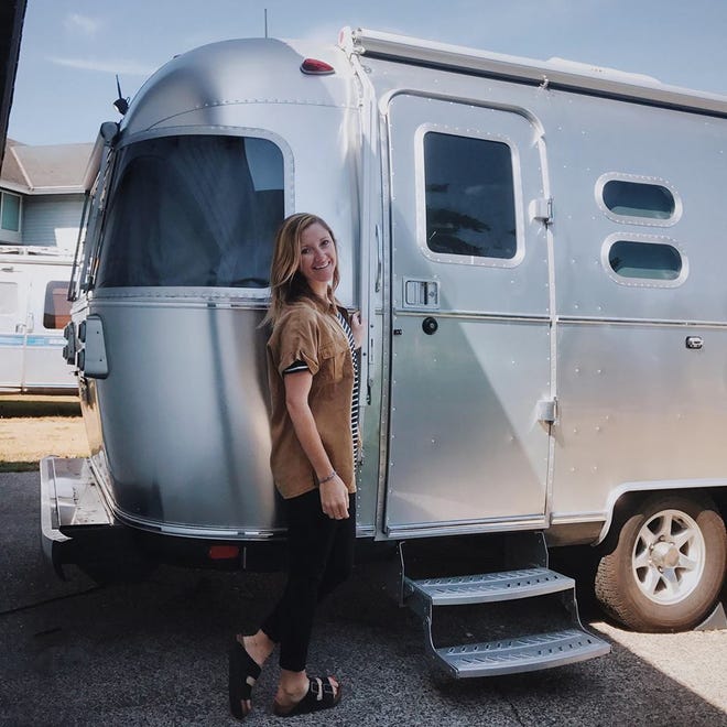 Stacey Powers poses next to her 2016 Flying Cloud Airstream in Sidney, Ohio.