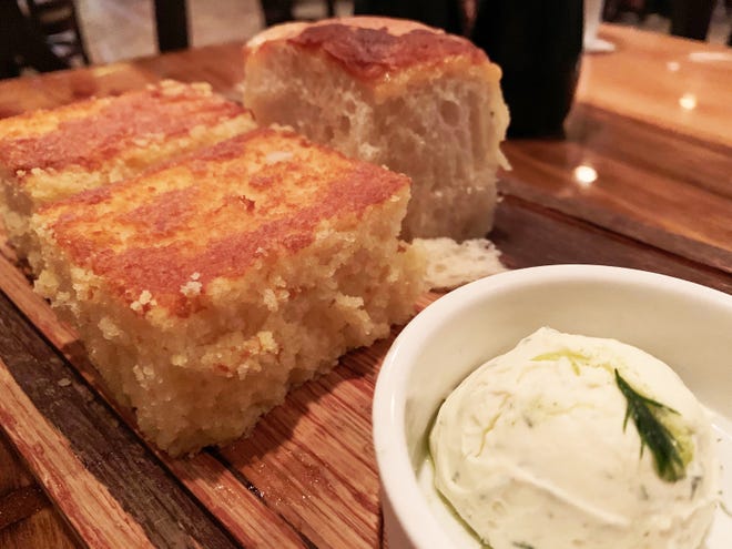 Gratis breads before dinner at The Oyster Society, Marco Island, include a sweet cornbread and a petit brioche.
