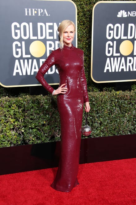 Nicole Kidman poses at the Golden Globe Awards.