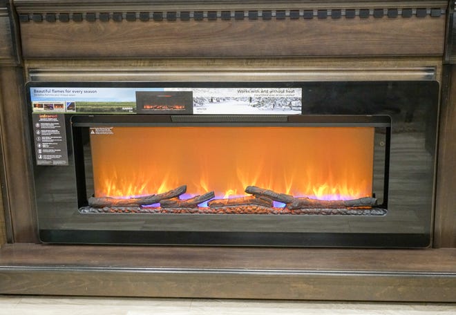 This RV is fitted with a fake fire that's can also emit heat when attached to a furnace.