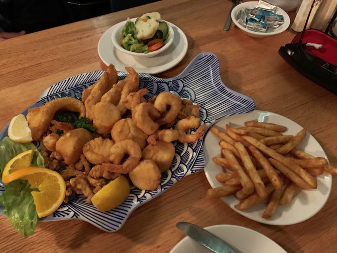A lightly fried combination platter â€“ featuring shrimp, fish fingers, scallops, oysters and clams from Pelican Bend, Isles of Capri.