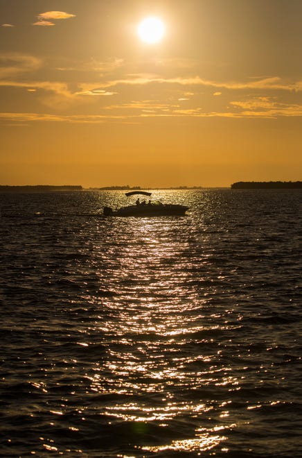 Boaters make their way to the Cape Coral Yacht Club close to sunset Thursday, October 28, 2018.