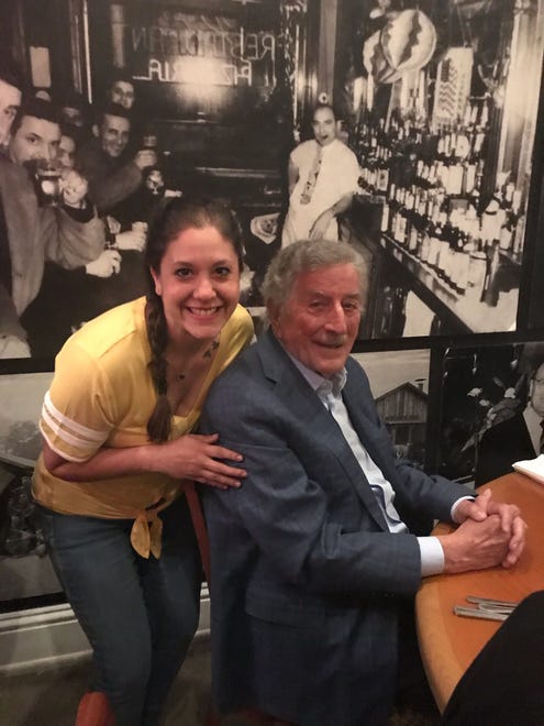 Grammy award-winner Tony Bennett stands with Jacqueline DellaRocca at Parmesan Pete's on Sunday, March 24, 2019. Bennett dined at the DellaRocca family's restaurant the night before performing at Artis—Naples.