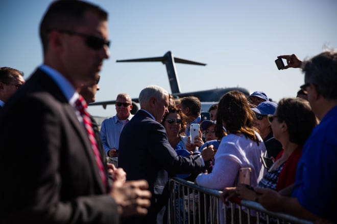 Vice President Mike Pence greets those who awaited his arrival at the Naples Airport via Air Force Two on Thursday, March 28, 2019. Pence signed autographs and took photos with many people in attendance.