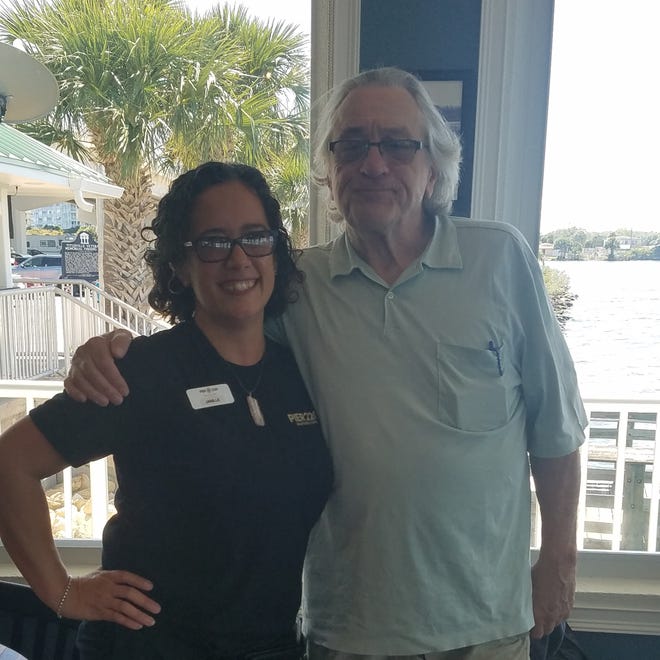 Janille Eclavea, a server at Pier 220, waited on Robert De Niro and his family at the Titusville restaurant. Eclavea called her super famous guest "really nice."