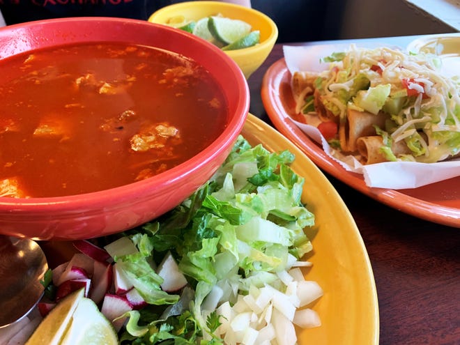 Pazole, left, and chicken flautas from Molcajetes, Golden Gate.