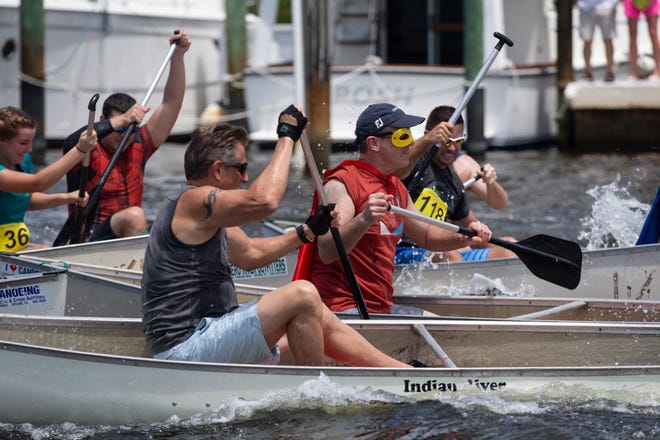 Ambitious Amateurs canoe race participants get ready for their race, Saturday, May 11, 2019, during the 43rd annual Great Dock Canoe Race at Crayton Cove in Naples.
