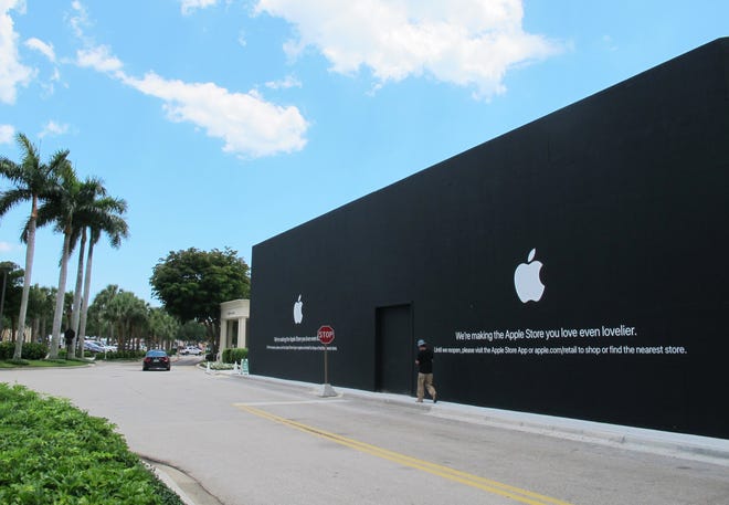 The Apple store at Waterside Shops in Naples looks similar to an iPhone box while under construction on the eastern edge of the mall in preparation for its reopening this fall.