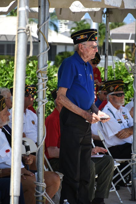 Veteran John Basic stands to be recognized. Marco Island commemorated Memorial Day on Monday morning with a ceremony at Veterans' CommunityPark, with a keynote address by American Legion Post #404 Commander Lee Rubenstein.