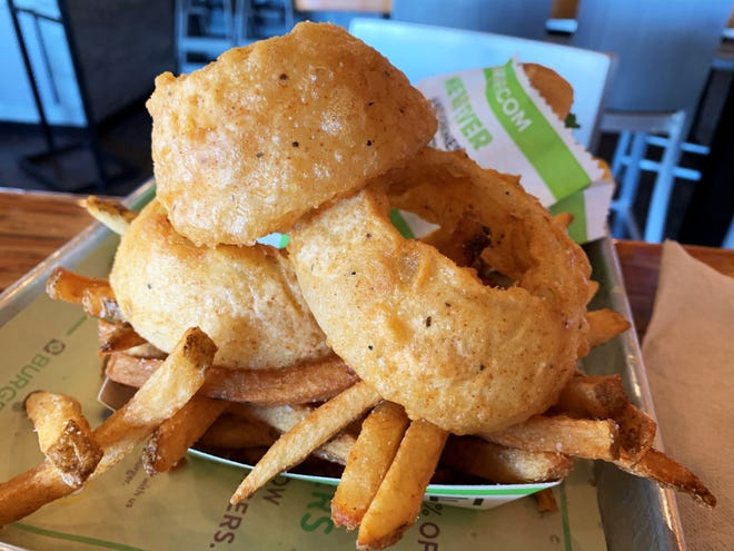 The “Cry + Fry” a blend of hand-cut fries and double-battered onion rings from BurgerFi.