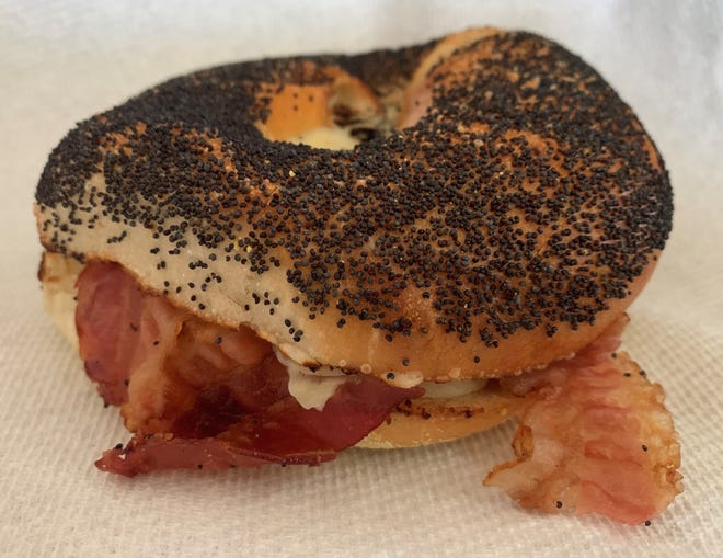 A bacon, egg and cheese poppyseed bagel from Empire Bagel Factory, Marco Island.