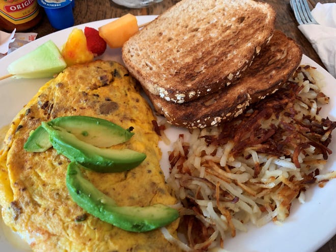 An omelet, hash browns and wheat toast from Doreen's Cup of Joe, Marco Island.