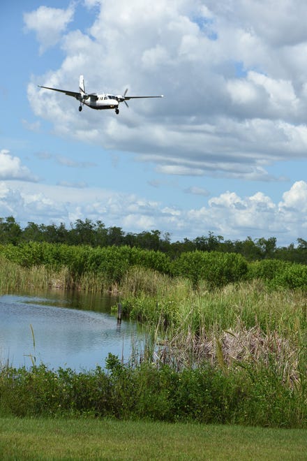 A private multi-engine aircraft comes in to land. The Marco Island Executive Airport on Mainsail Drive is undertaking roughly $13 million of new facilities' expansion.