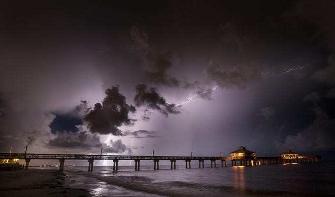 Lightning strikes in the Gulf of Mexico near the Fort Myers Beach pier on Monday, August 26, 2019. Recent storms have created light shows throughout Southwest Florida.